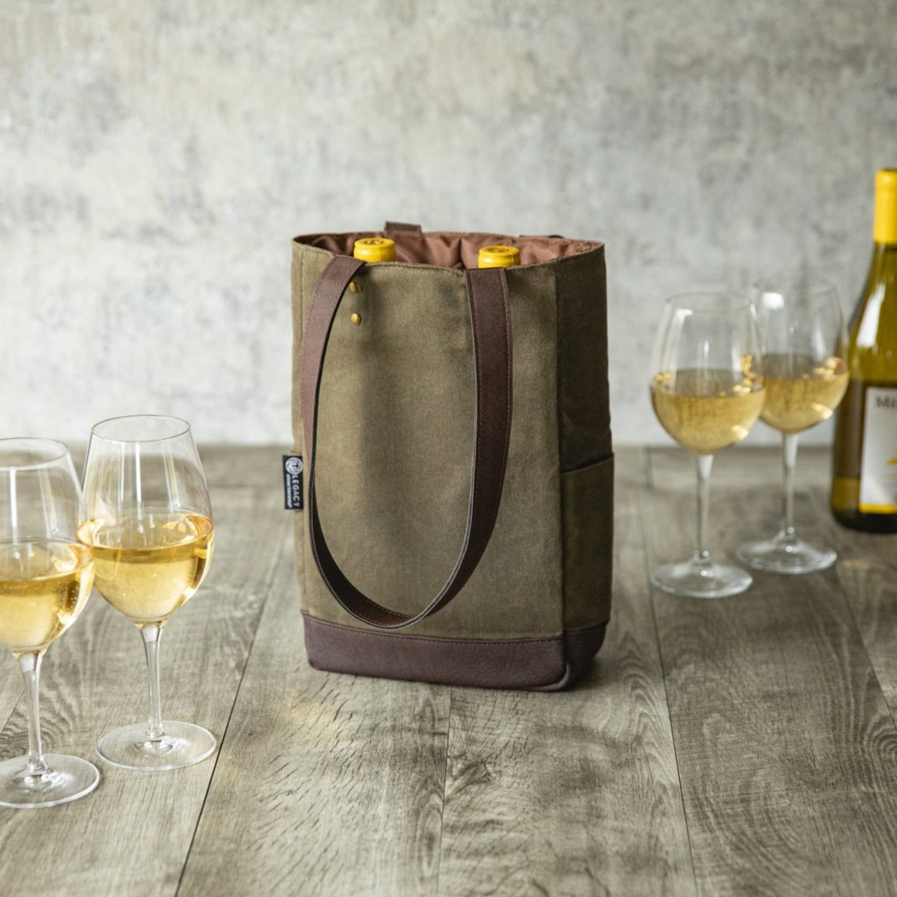 Olive Canvas and Leather Insulated Wine Bottle Bag holding two bottles